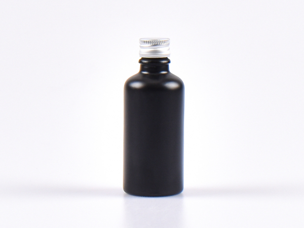 kosmetikflasche-glas-schwarzmatt-golddeckel