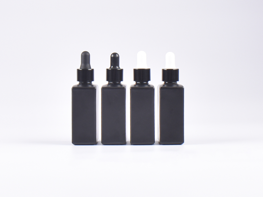Schwarzglasflasche "Miro" 50ml, mit Pipette schwarz