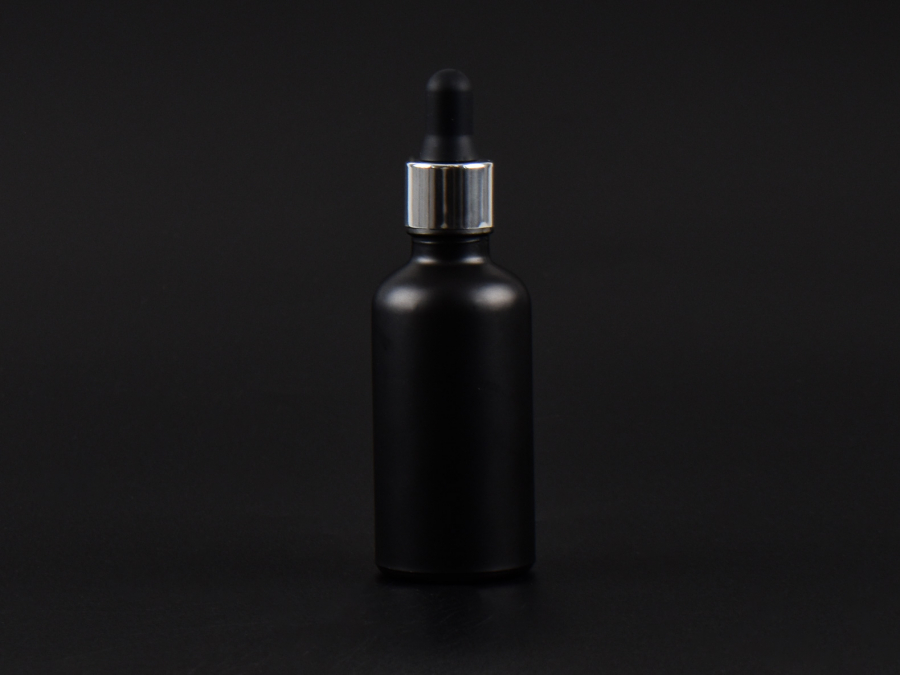 Schwarzglasflasche 50ml, mit Pipette silber