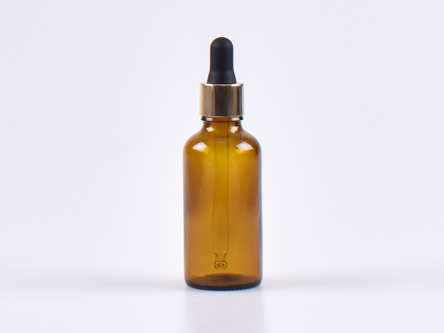 Braunglasflasche 50ml, mit Pipette gold
