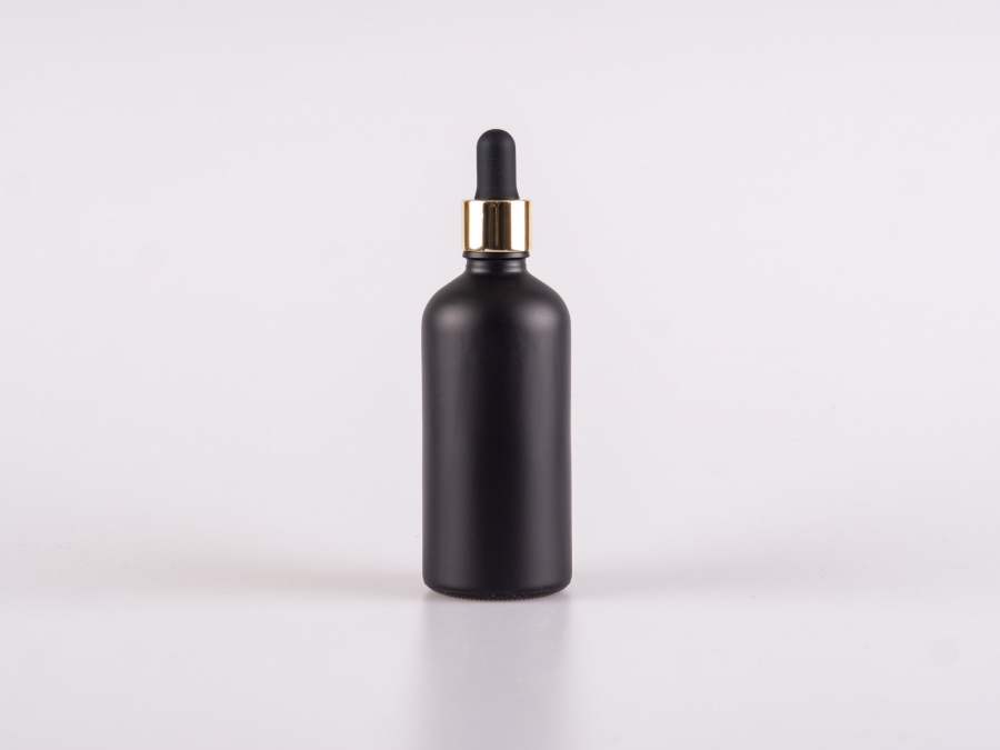 Schwarzglasflasche 100ml, mit Pipette gold