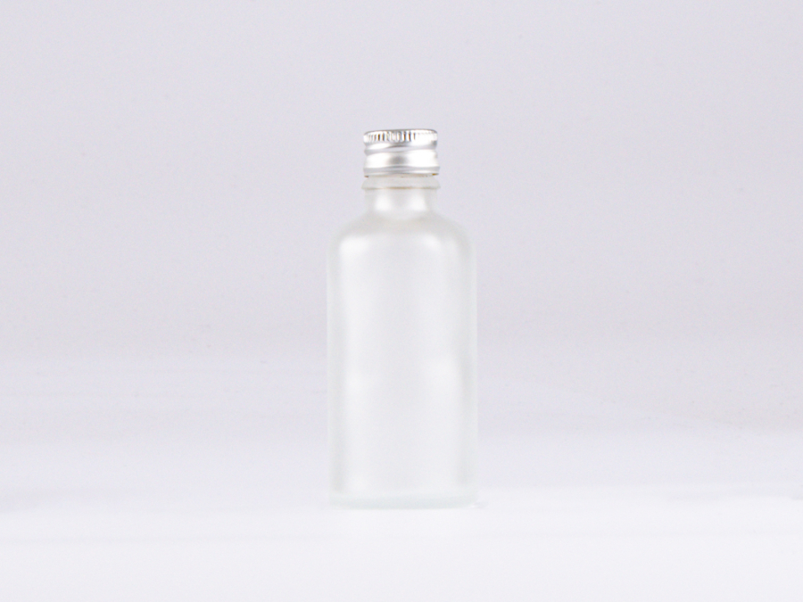 kosmetikflasche-glas-schwarzmatt-golddeckel