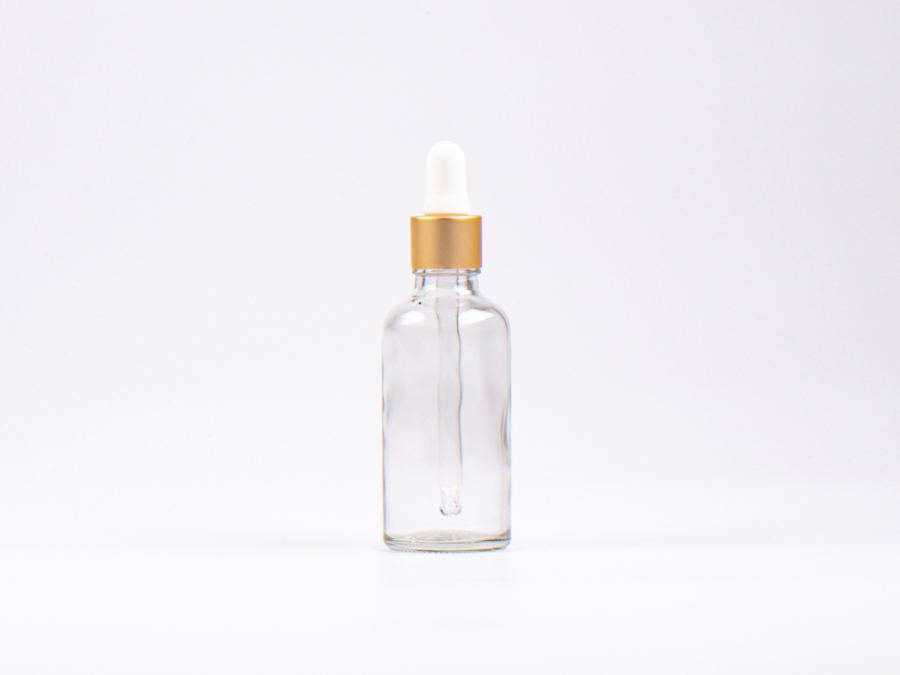 Klarglasflasche 50ml, mit Pipette gold