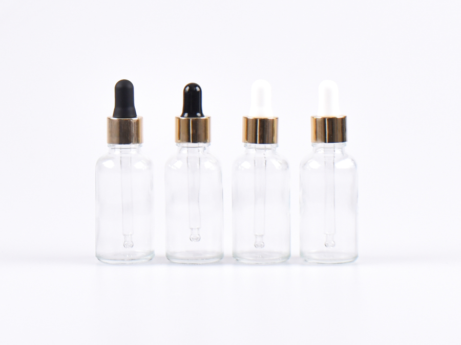 Klarglasflasche 30ml, mit Pipette gold