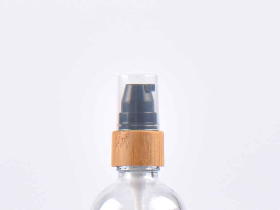 Braunglasflasche 100ml,  mit Lotionspumpe Bambus