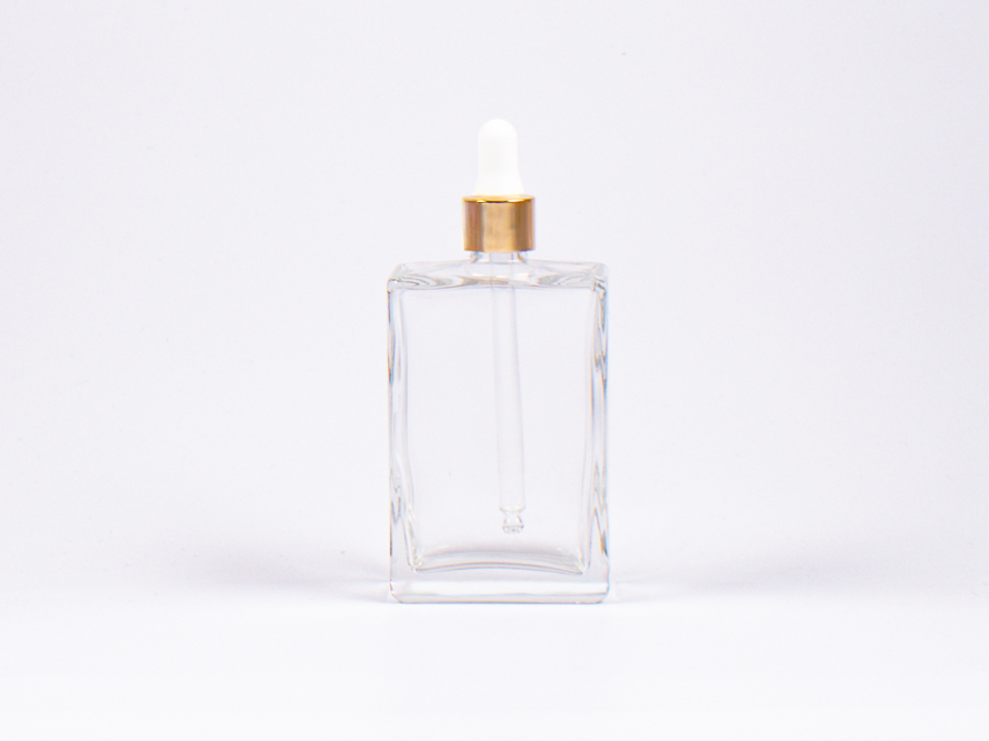Klarglasflasche Miro 100 ml - Pipette gold