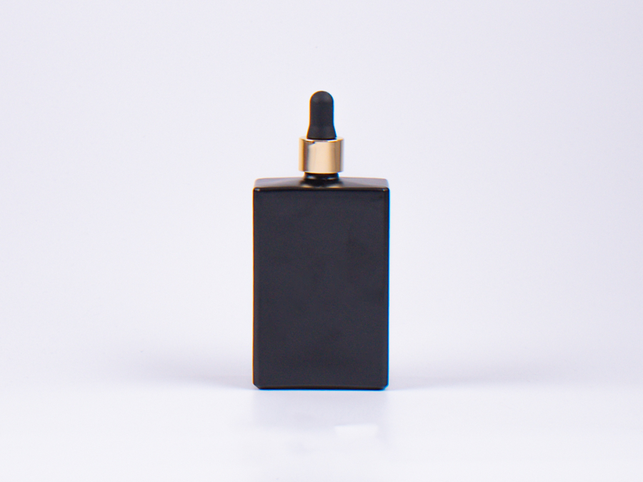 Schwarzglasflasche Miro 100 ml - Pipette gold