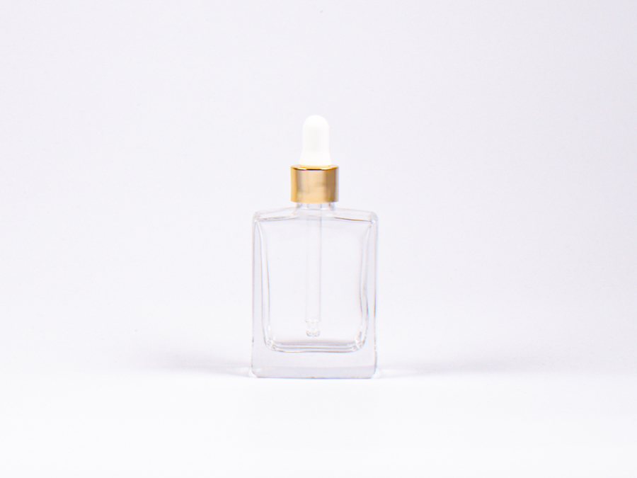 Klarglasflasche "Miro" 50ml, mit Pipette gold