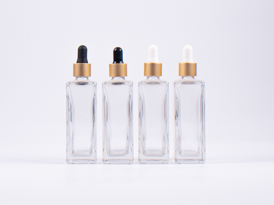 Klarglasflasche Miro 100 ml - Pipette gold