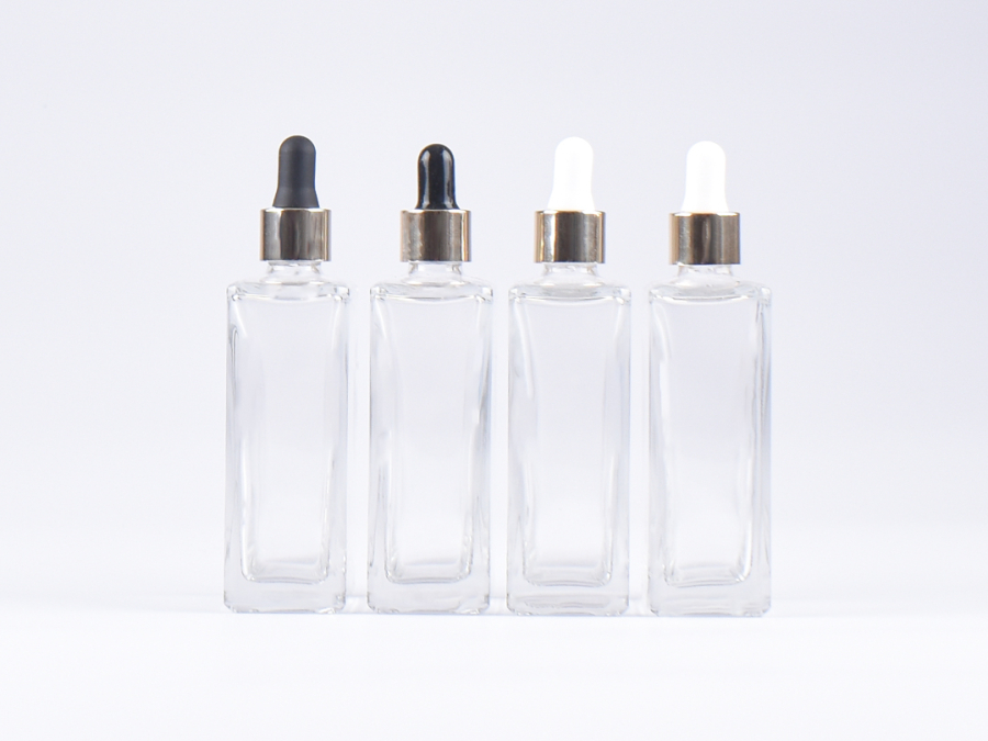 Klarglasflasche Miro 100 ml - Pipette gold