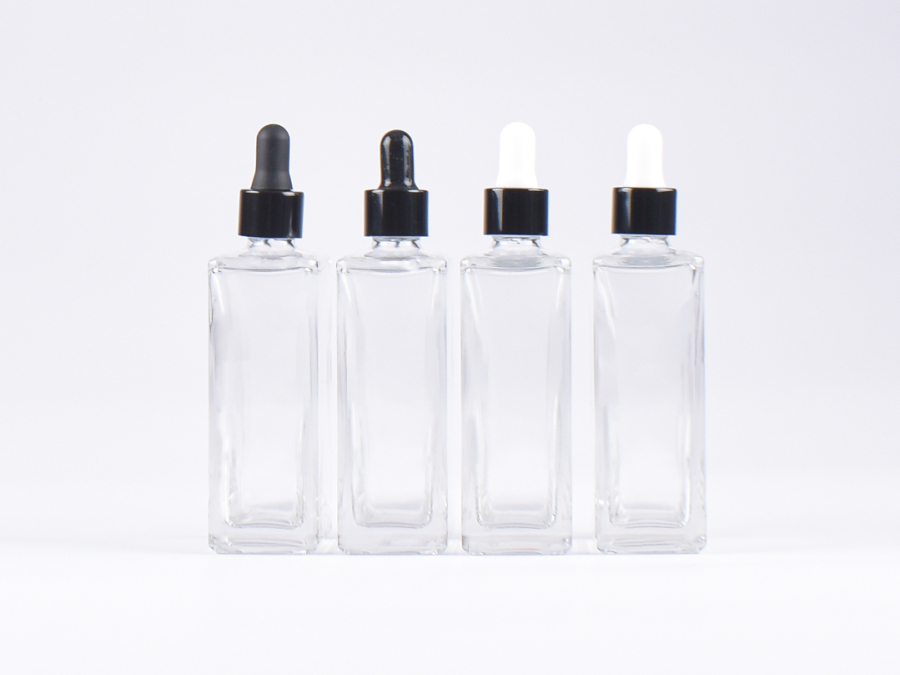 Klarglasflasche "Miro" 100ml, mit Pipette schwarz