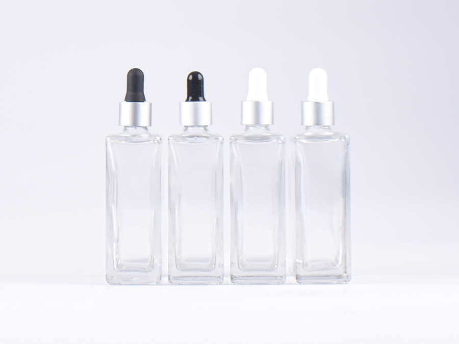 Klarglasflasche "Miro" 100ml, mit Pipette silber matt