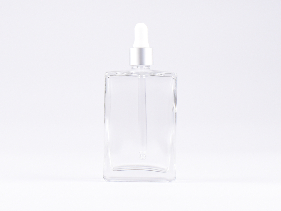 Klarglasflasche "Miro" 100ml, mit Pipette silber matt
