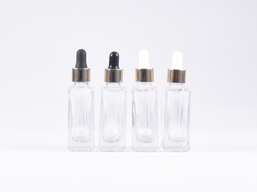 Klarglasflasche "Miro" 50ml, mit Pipette gold
