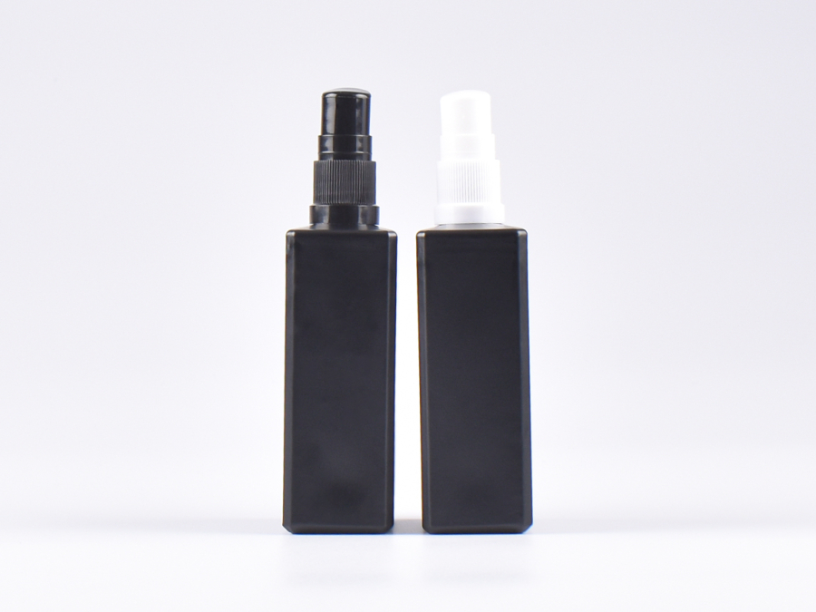 Schwarzglasflasche "Miro" 100ml, mit Lotionspumpe Kunststoff