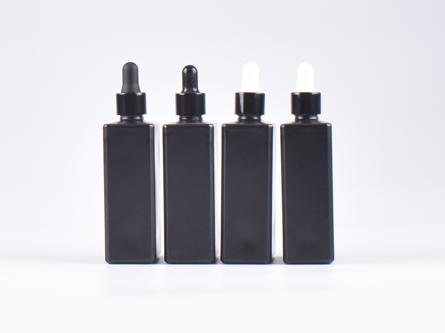 Schwarzglasflasche "Miro" 100ml, mit Pipette schwarz