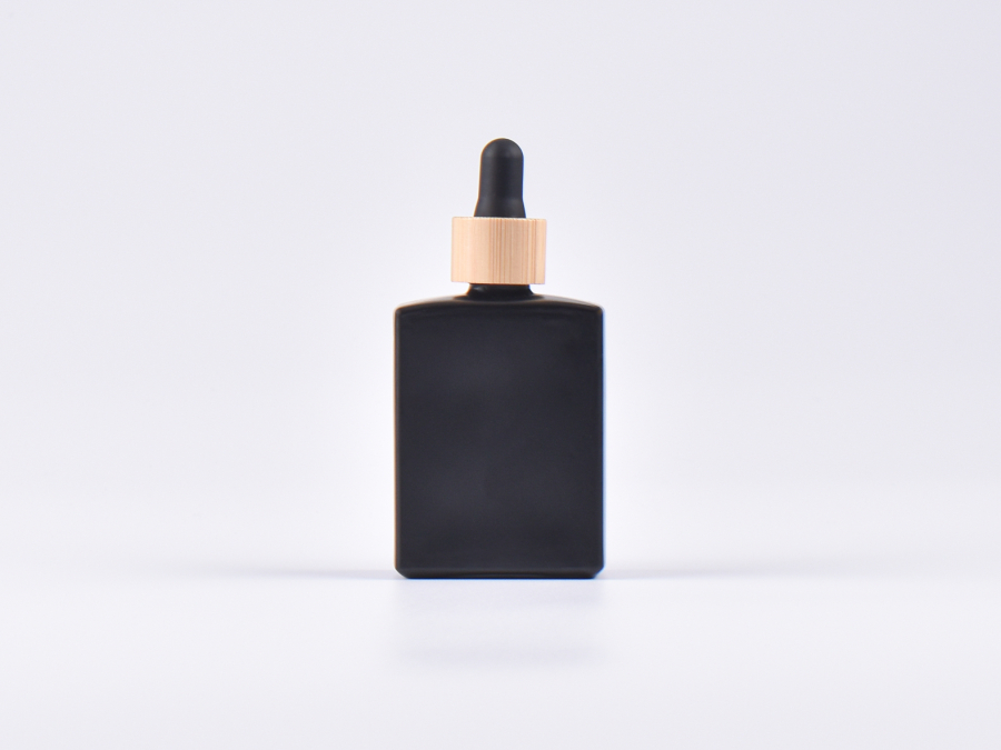 Schwarzglasflasche "Miro" 50ml, mit Pipette Bambus