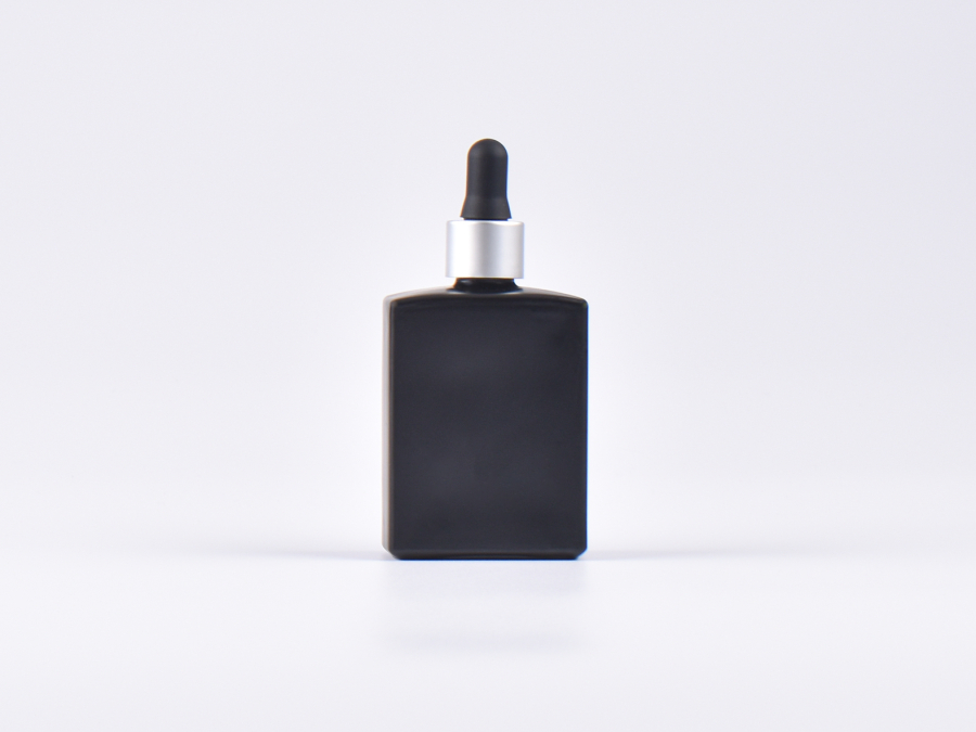 Schwarzglasflasche "Miro" 50ml, mit Pipette silber matt