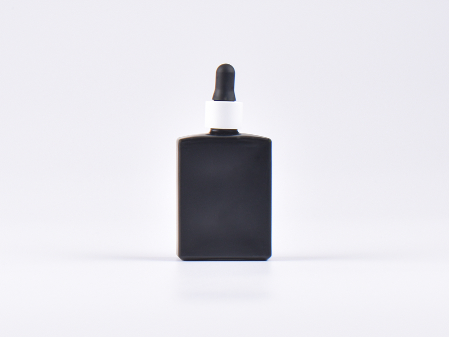Schwarzglasflasche "Miro" 50ml, mit Pipette weiss