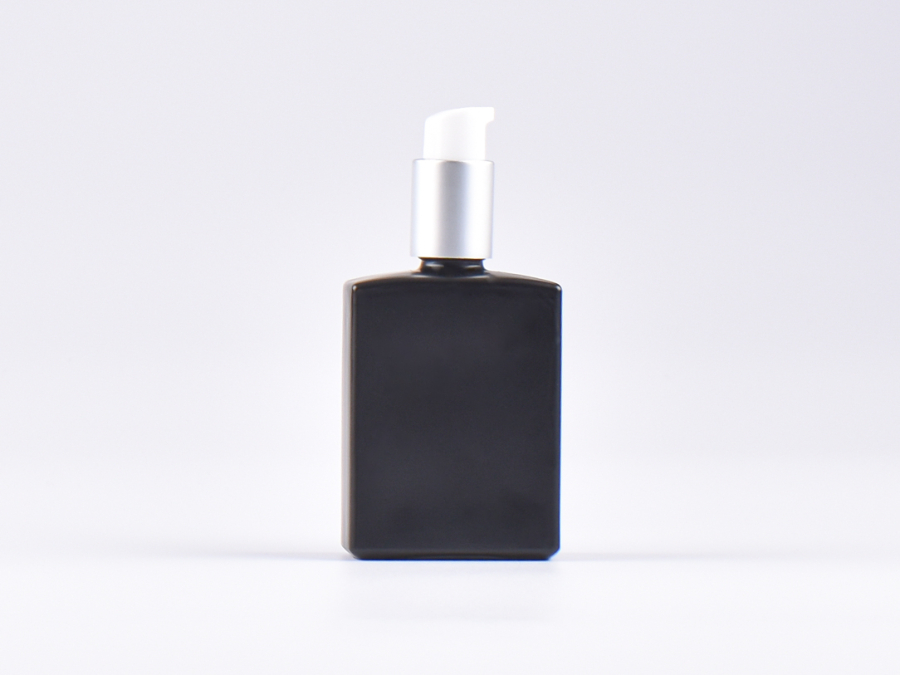 Schwarzglasflasche "Miro" 50ml, mit Lotionspumpe Aluminium, 4 Color