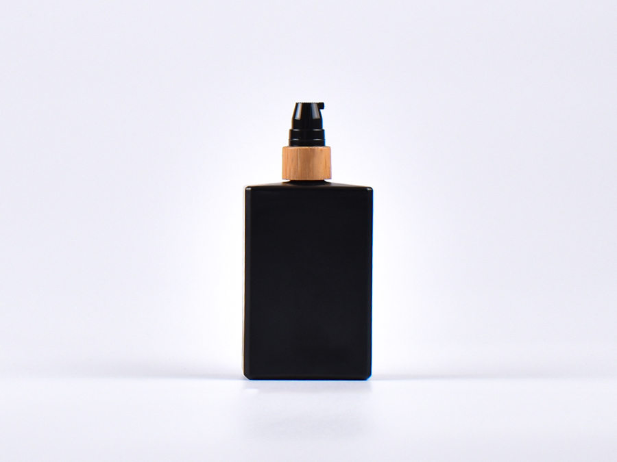 Schwarzglasflasche Miro 100 ml - Lotionspumpe Bambus