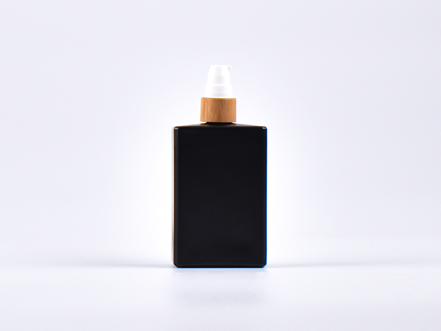 Schwarzglasflasche Miro 100 ml - Lotionspumpe Bambus
