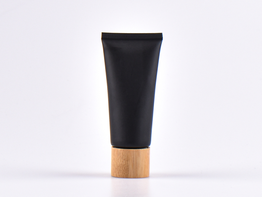 Kosmetiktube 60ml, schwarz-matt, mit Deckel Bambus