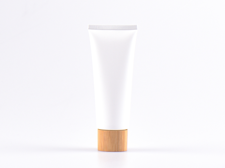 Kosmetiktube 100ml, weiss-matt, mit Deckel Bambus