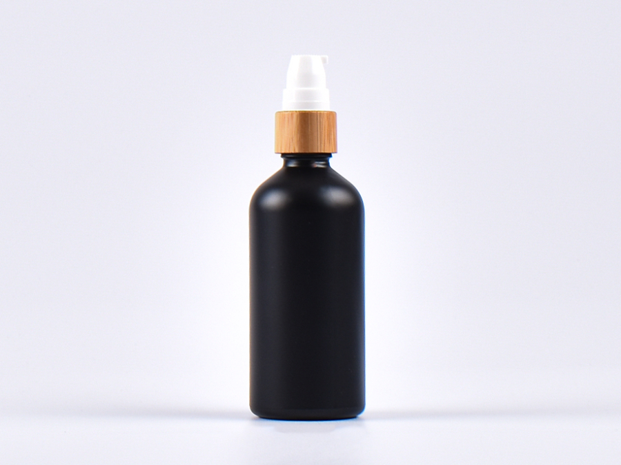 Schwarzglasflasche 100ml, mit Lotionspumpe Bambus
