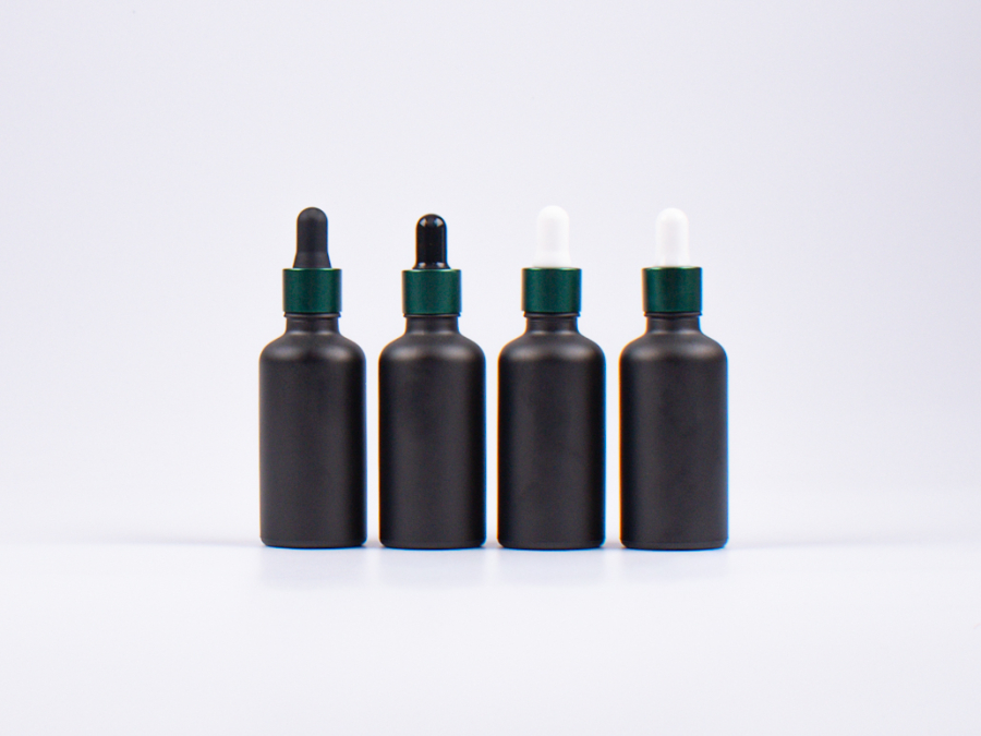 Schwarzglasflasche 100ml, mit Pipette grün-matt