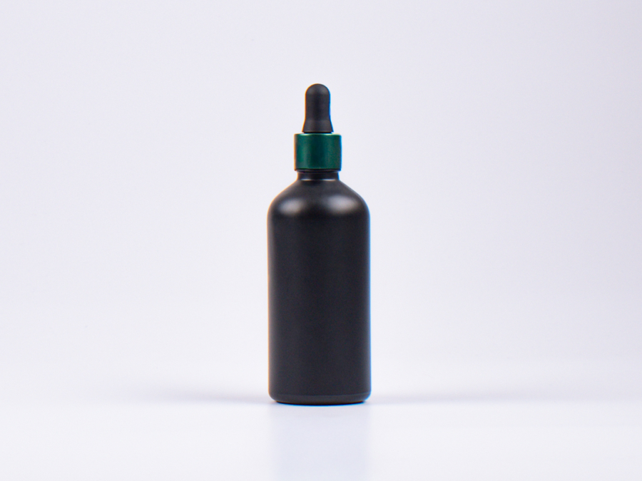 Schwarzglasflasche 100ml, mit Pipette grün-matt