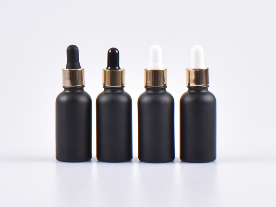 Schwarzglasflasche 100ml, mit Pipette gold