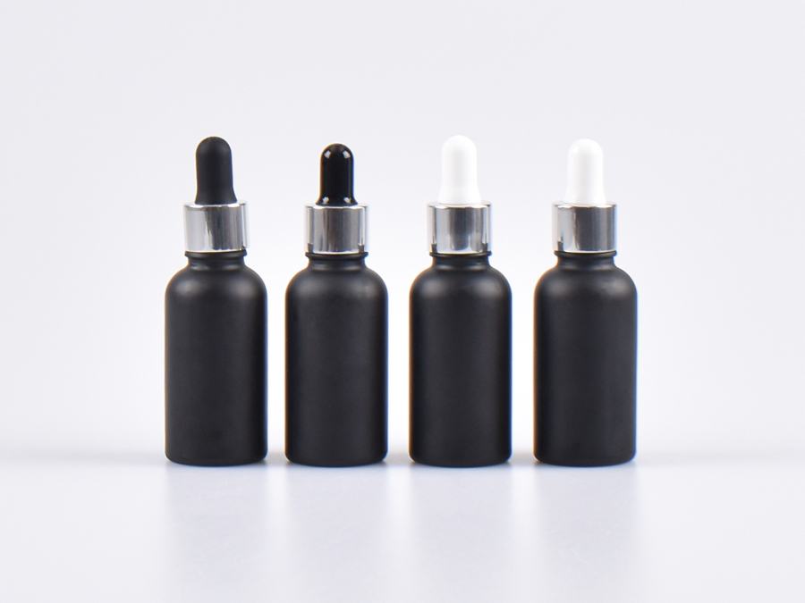 Schwarzglasflasche 30ml, mit Pipette silber-glanz