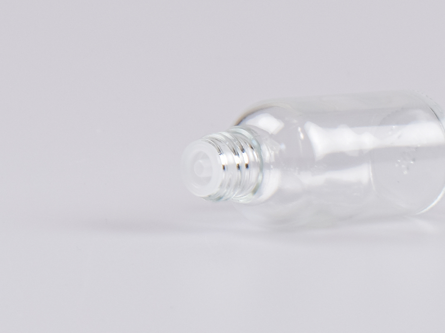 Klarglasflasche 50ml, mit Tropfmontur OV, geriffelt
