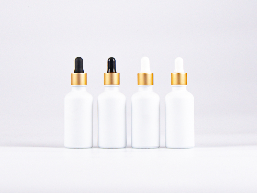 Weissglasflasche 100ml, mit Pipette gold