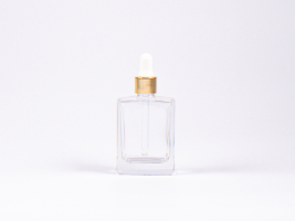 Klarglasflasche "Miro" 50ml, mit Pipette gold