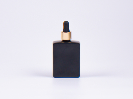 Schwarzglasflasche "Miro" 50ml, mit Pipette gold