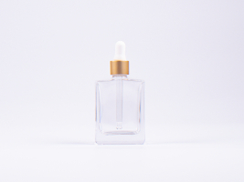 Klarglasflasche "Miro" 50ml, mit Pipette gold