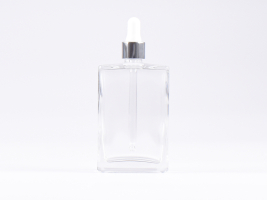 Klarglasflasche "Miro" 100ml, mit Pipette silber glanz