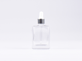 Klarglasflasche "Miro" 50ml, mit Pipette silber glanz