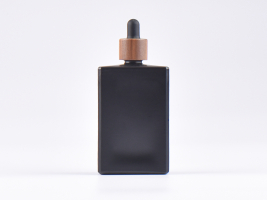 Schwarzglasflasche "Miro" 100ml, mit Pipette Walnut