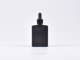 Schwarzglasflasche "Miro" 50ml, mit Pipette schwarz