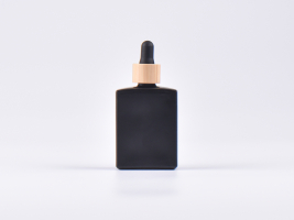Schwarzglasflasche "Miro" 50ml, mit Pipette Bambus
