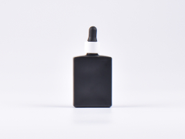 Schwarzglasflasche "Miro" 50ml, mit Pipette weiss