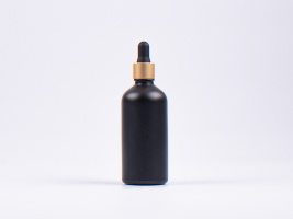 Schwarzglasflasche 100ml, mit Pipette gold