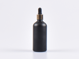 Schwarzglasflasche 100ml, mit Pipette gold