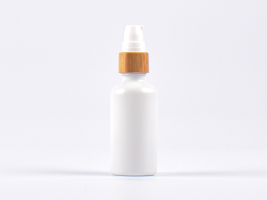 Weissglasflasche 50ml, mit Lotionspumpe Bambus